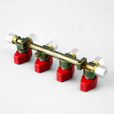 A red and white Dethleffs motorhome four-way Truma gas isolation valve.