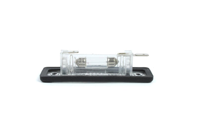 A clear Dethleffs motorhome rear number plate light with a black rim.