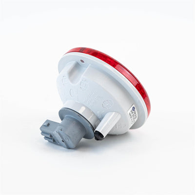 A red Roller Team motorhome brake light.