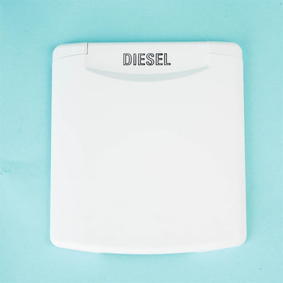 A white Dethleffs motorhome fuel cap cover.
