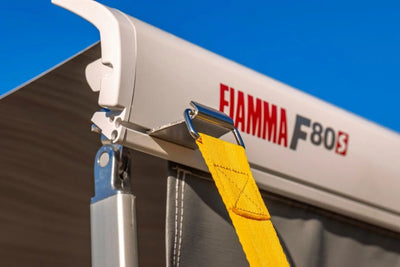 Awning accessory shown being used on motorhome