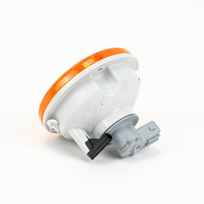 An orange Roller Team motorhome rear indicator light.