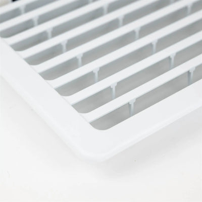 A white Dethleffs motorhome Thetford fridge ventilation grille.