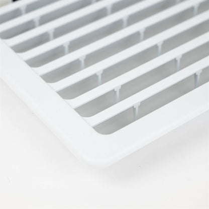 A white Dethleffs motorhome Thetford fridge ventilation grille.