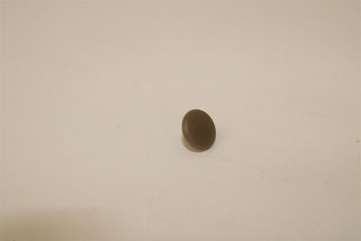 A brown Roller Team motorhome screw cap cover.
