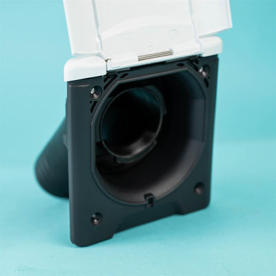 A white Dethleffs motorhome fuel filler housing cap.