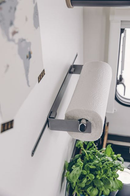 A brushed stainless steel Sunlight motorhome kitchen roll holder.