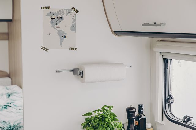 A brushed stainless steel Sunlight motorhome kitchen roll holder.