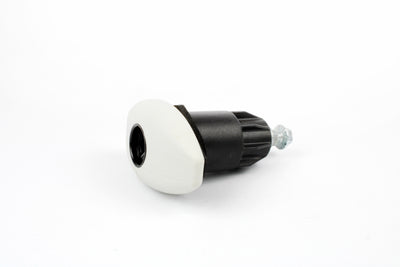 A white Roller Team motorhome locker door handle.