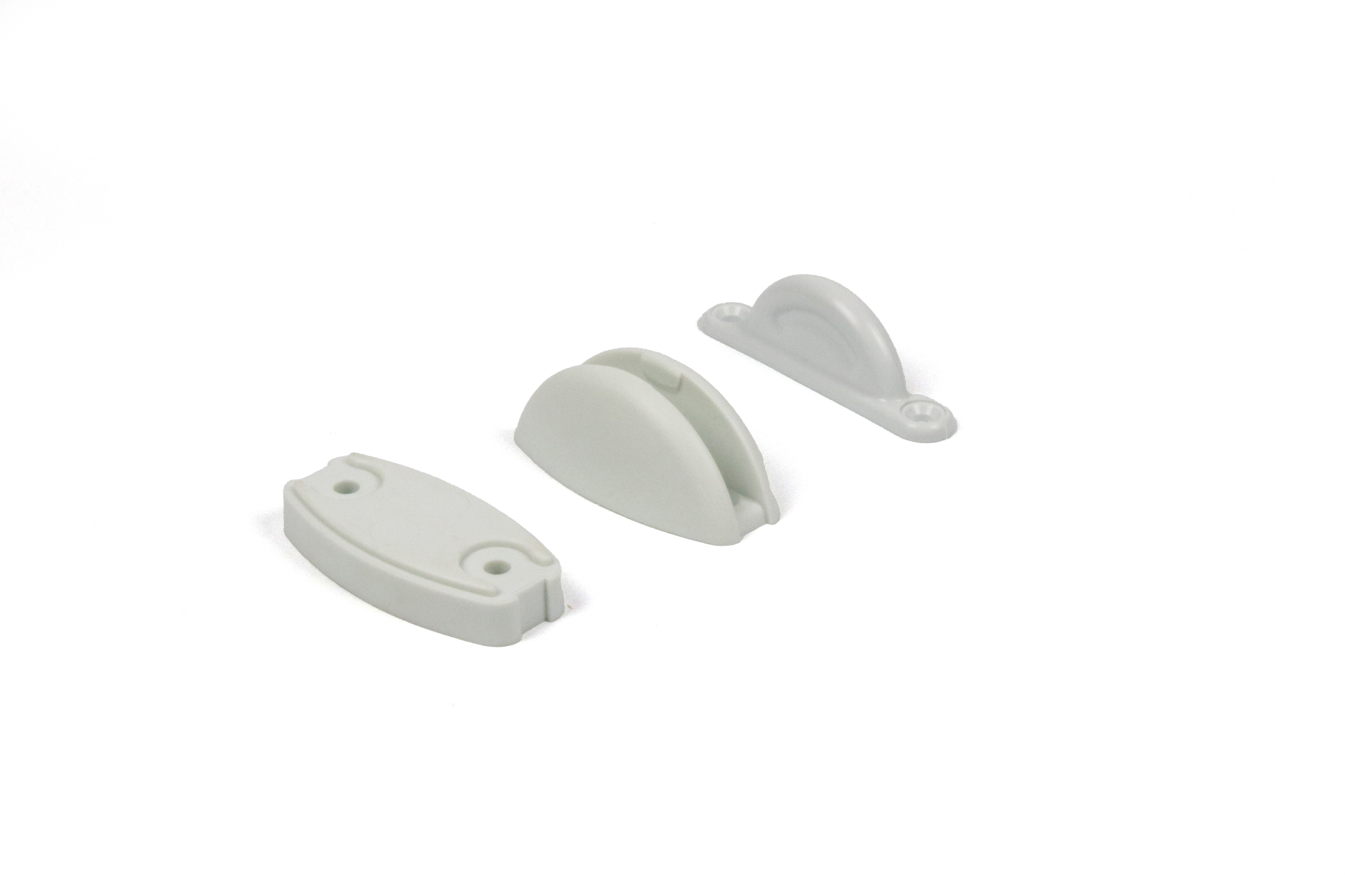 A white Dethleffs motorhome habitation door retainer catch.