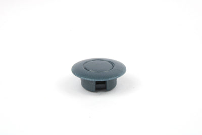 A grey Roller Team motorhome decorative screw cap cover.
