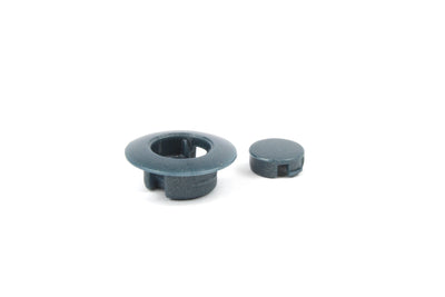 A grey Roller Team motorhome decorative screw cap cover.
