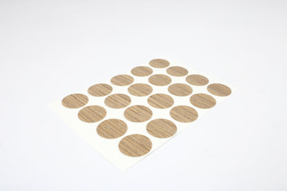 Set of 20 oak paper dots on a white background