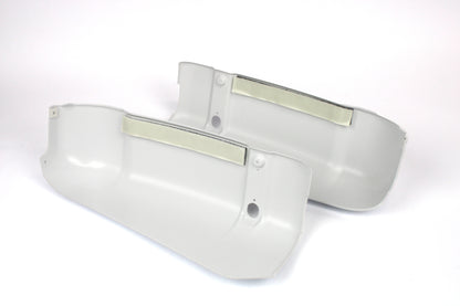 White bumper end caps on a white background