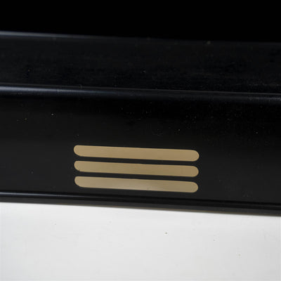 A black Roller Team motorhome access step external cover.