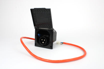 Black electrical connector with orange cable on a white background