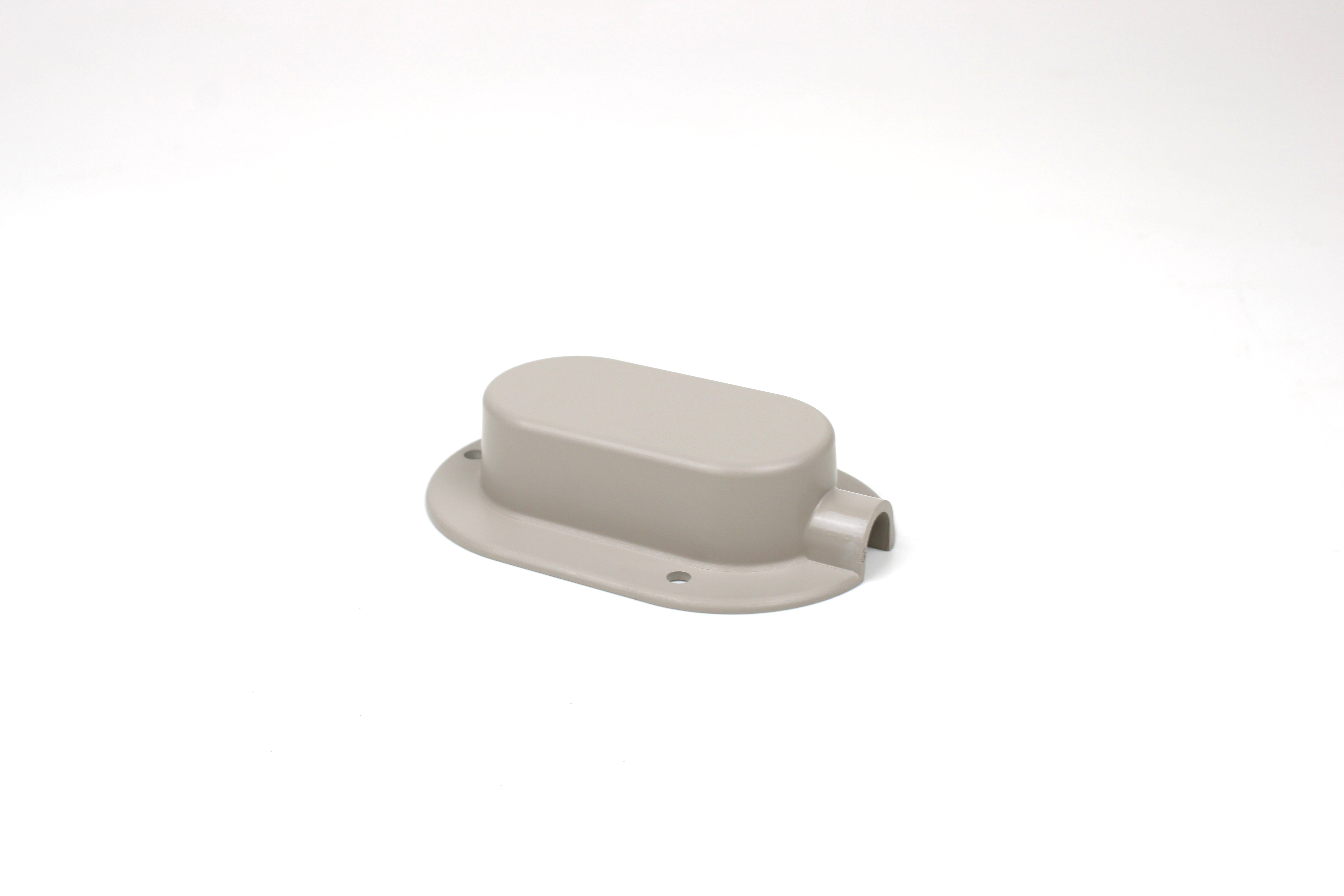 Light grey cable entry cover on white background