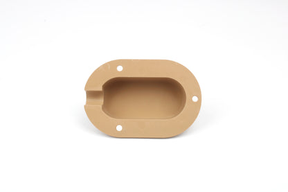 Beige cable entry cover on white background