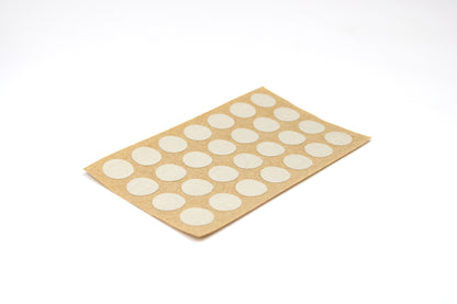 Sheet of wood effect dot stickers stickers on a beige backing