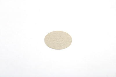 A sheet of casino pebble grey Dethleffs self-adhesive dot stickers on a beige backing.