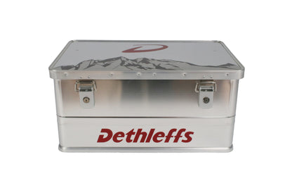 An aluminium Dethleffs motorhome storage box with branded stickers.