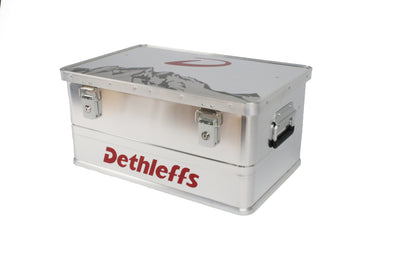 An aluminium Dethleffs motorhome storage box with branded stickers.