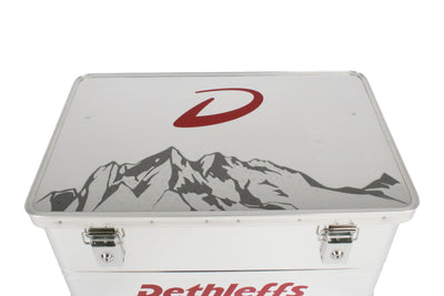 An aluminium Dethleffs motorhome storage box with branded stickers.