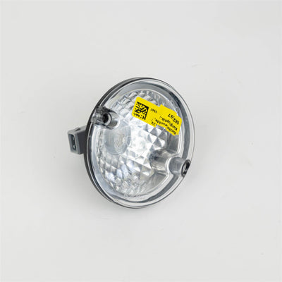 A Dethleffs motorhome reverse light with a transparent bulb.