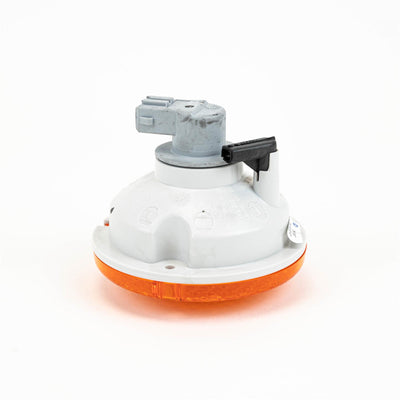 An orange Roller Team motorhome rear indicator light.