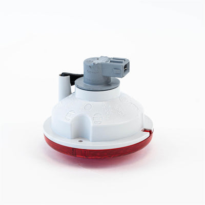 A red Roller Team motorhome brake light.
