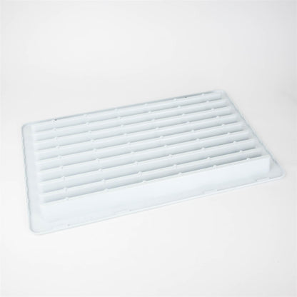 A white Dethleffs motorhome Thetford fridge ventilation grille.