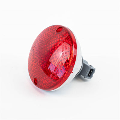 A red Roller Team motorhome brake light.