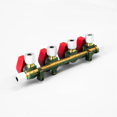 A red and white Dethleffs motorhome four-way Truma gas isolation valve.