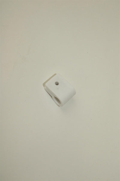 A white Dethleffs fastening clamp.