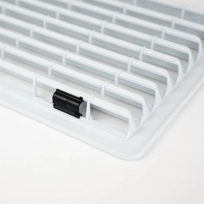 A white Dethleffs motorhome Thetford fridge ventilation grille.