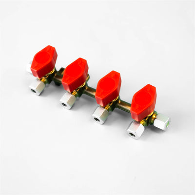 A red and white Dethleffs motorhome four-way Truma gas isolation valve.