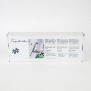 A brushed stainless steel Sunlight motorhome kitchen roll holder.