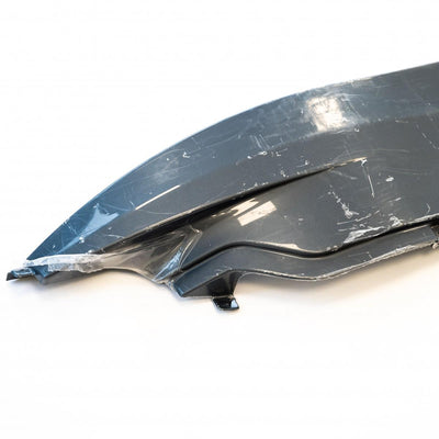 A grey offside Roller Team Zefiro 690 motorhome front skirt.